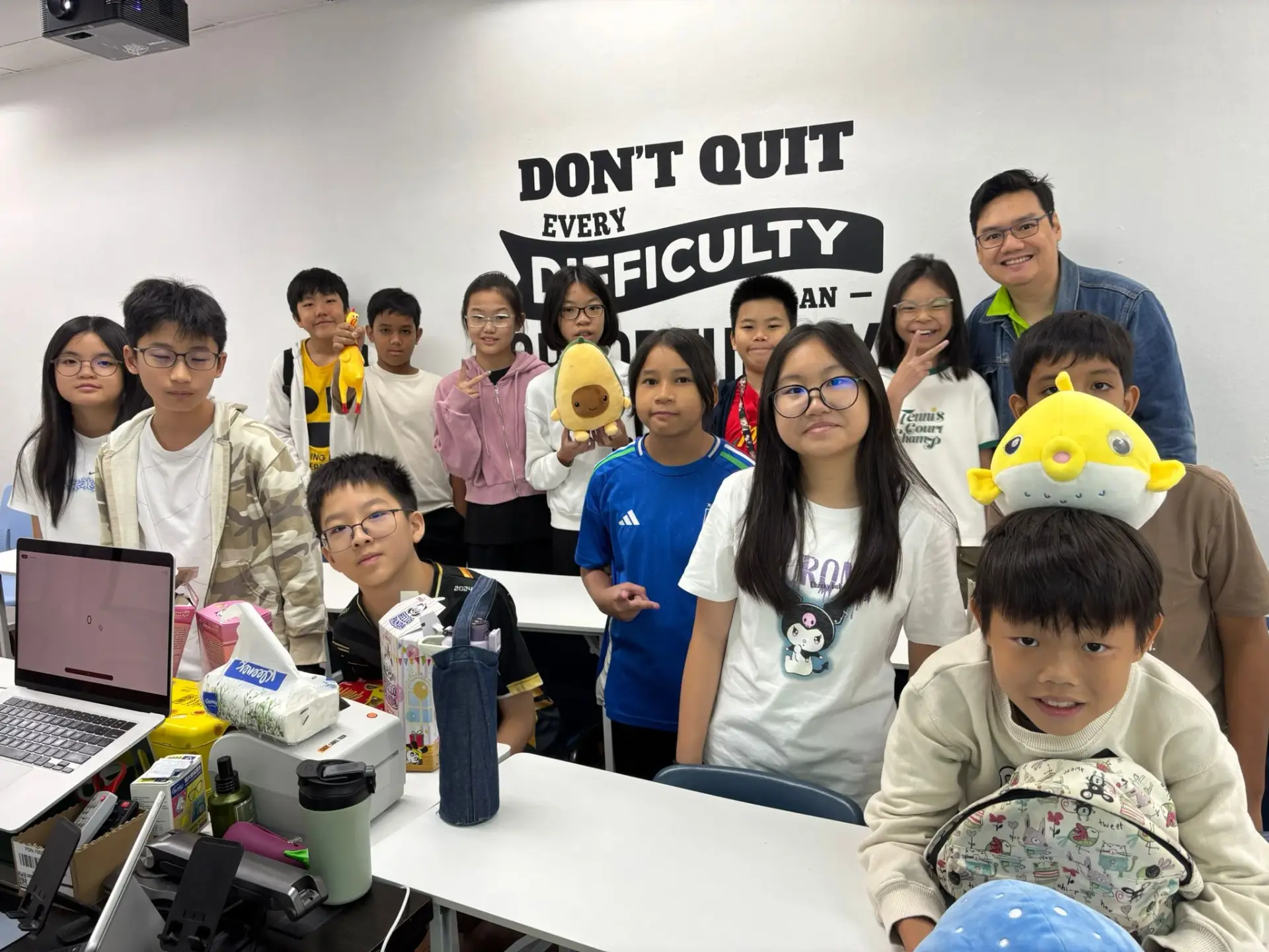 Mr Daniel Tay with Bestminds Academy students